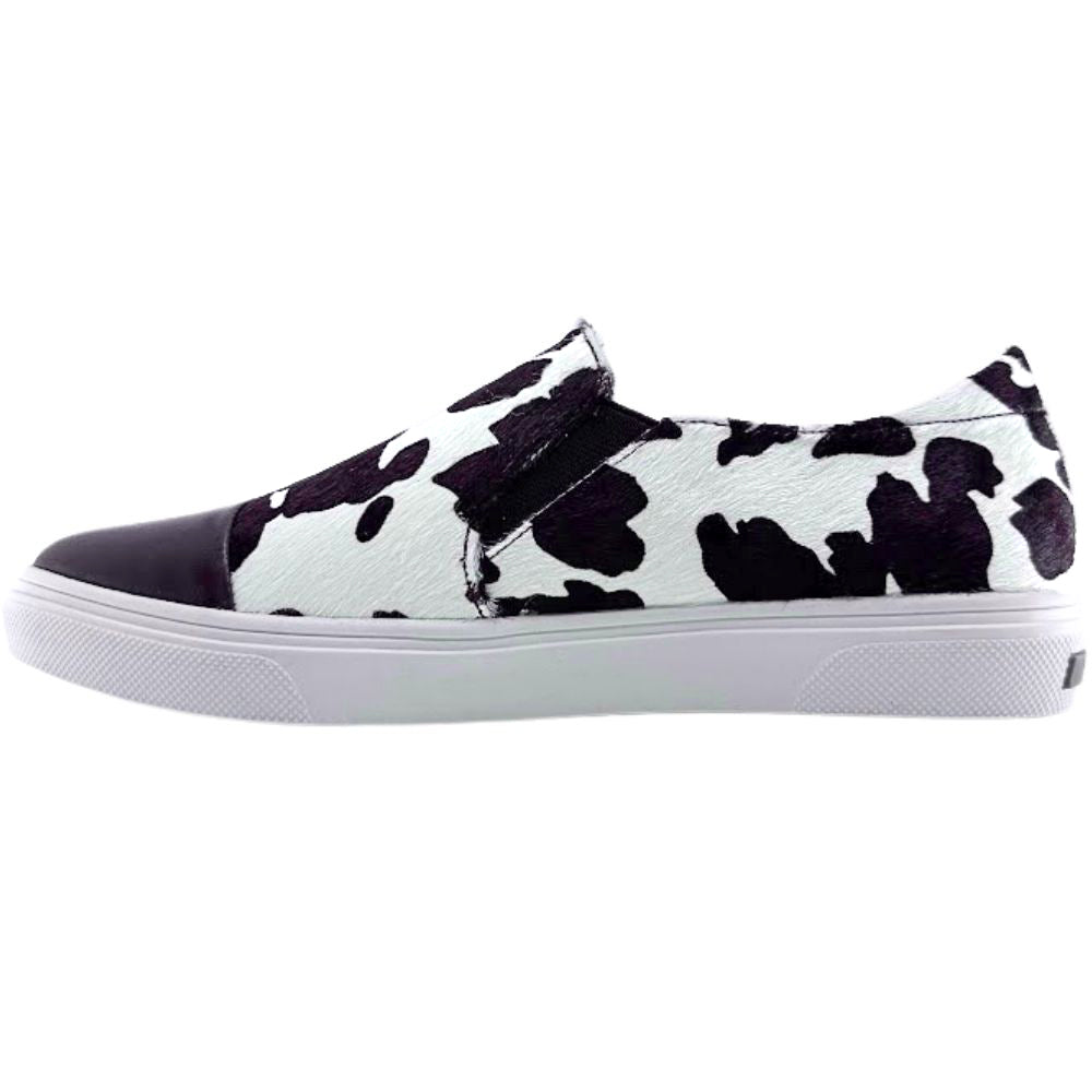 Brown and white cow print slip-on loafer sneaker on a white background