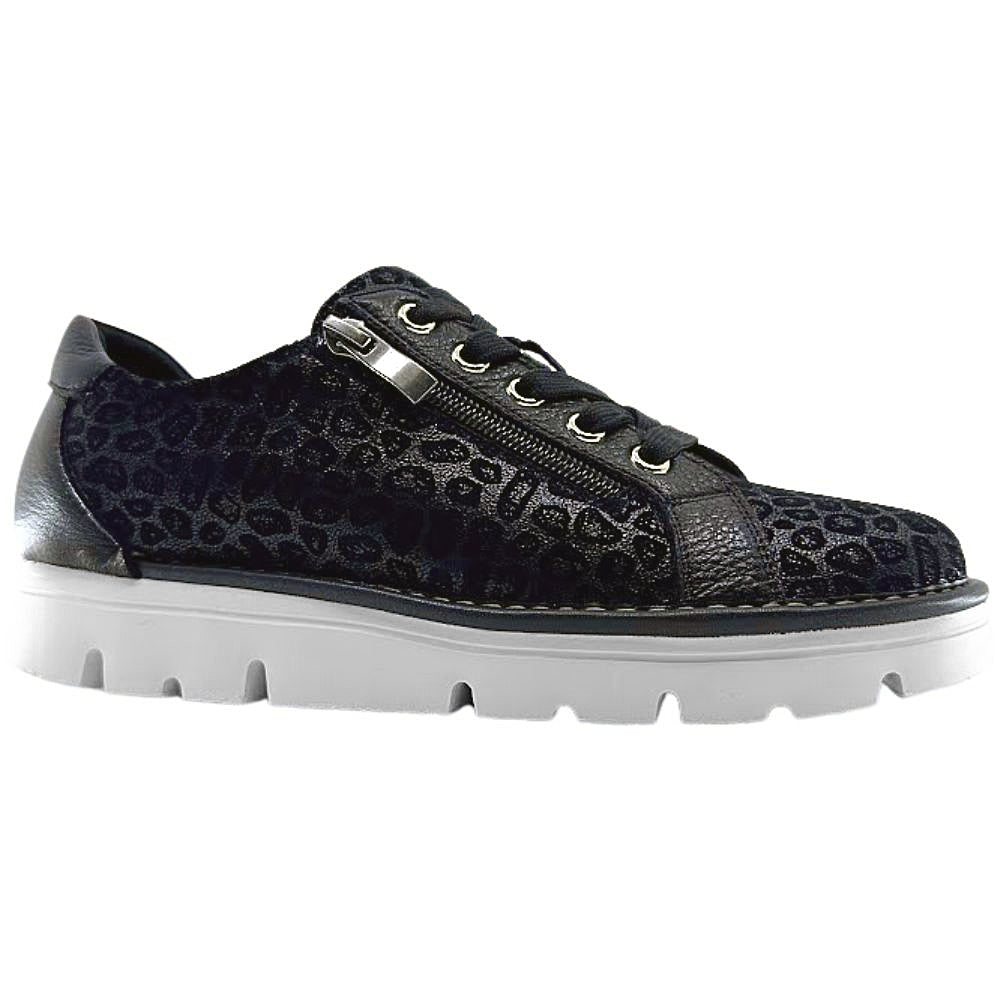 Black sneaker with leopard print pattern and side zip entry on a white background