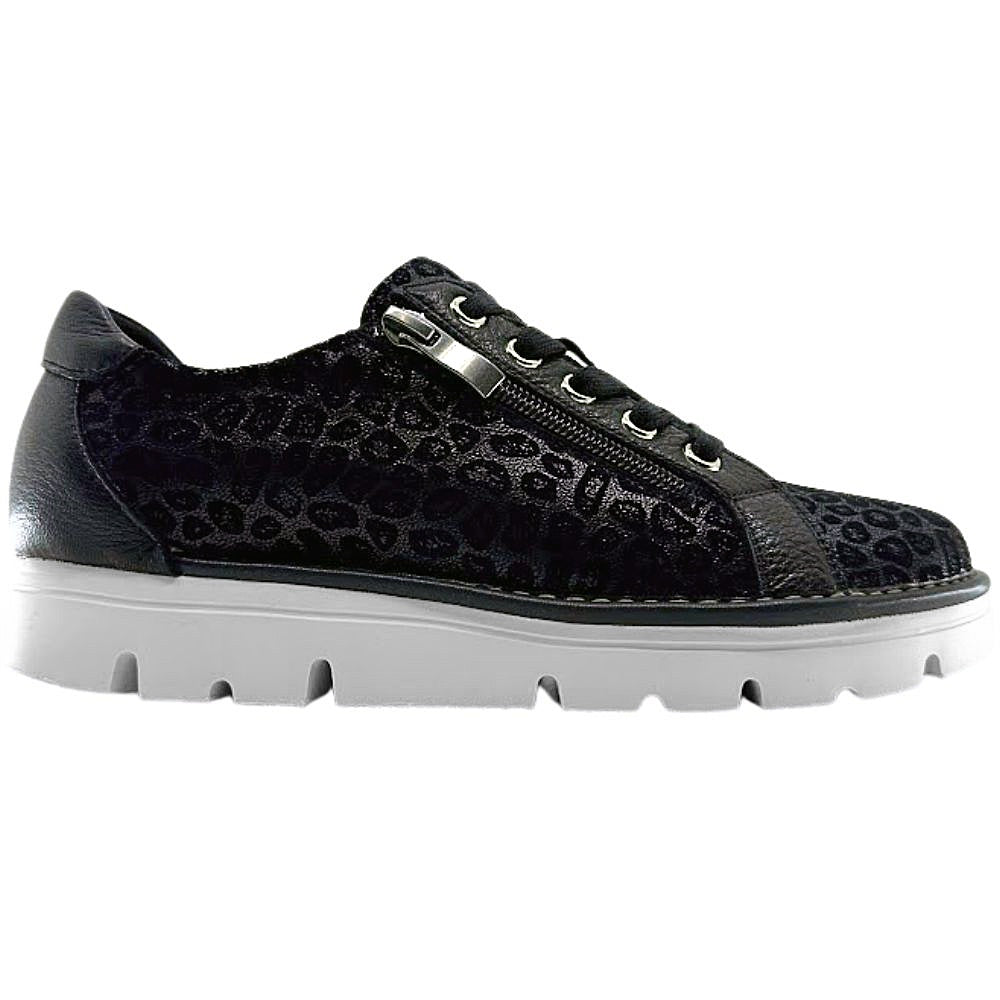 Black sneaker with leopard print pattern and side zip entry on a white background