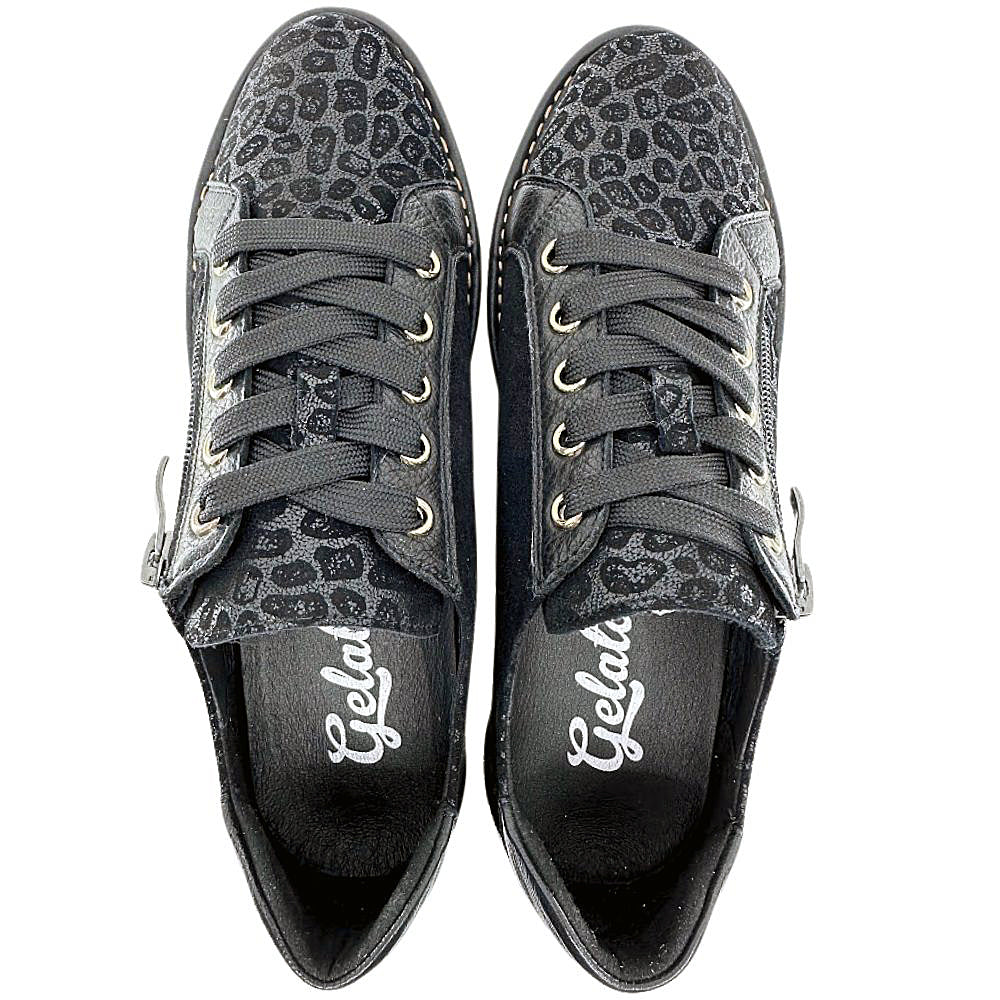 Pair of black sneakers with leopard print pattern on a white background