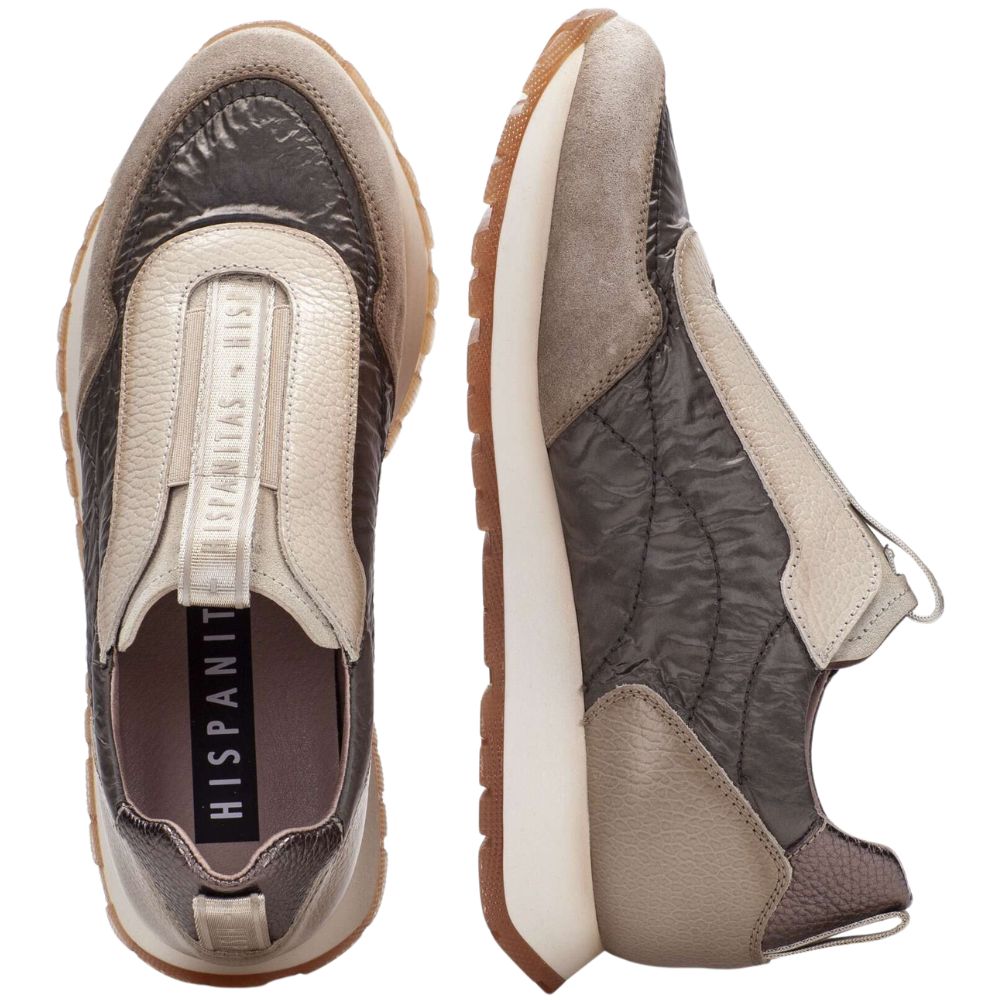 Pair of brown, cream and beige sneakers with white soles on a white background