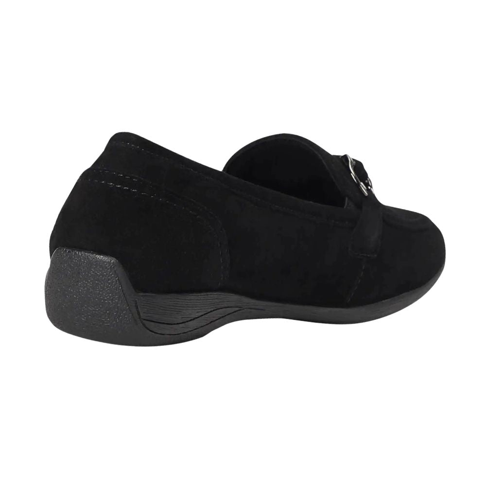 Black slip-on shoe with a silver horse-bit detail on a white background
