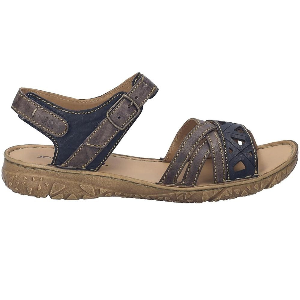 A single women's sandal shown in profile against a plain white background. The sandal features dark brown and navy blue straps and a tan-brown textured sole.