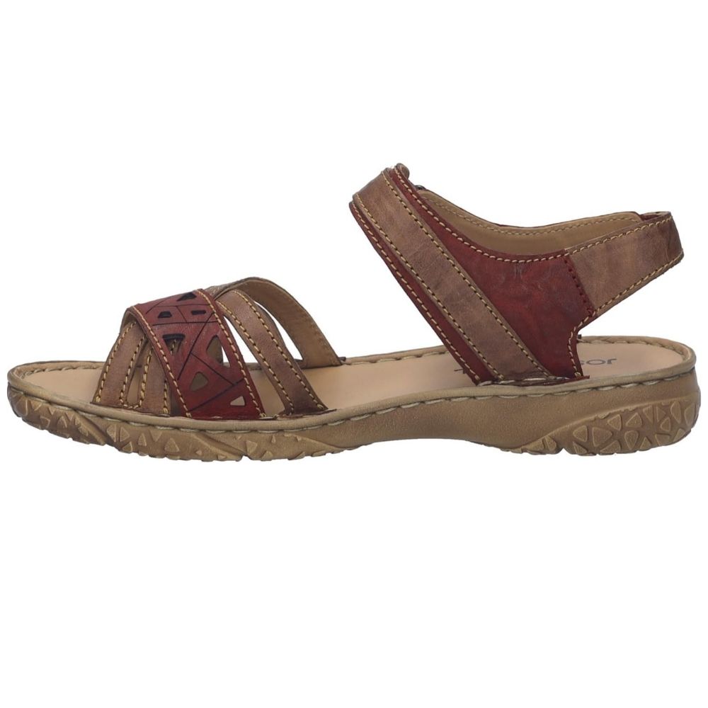 A women's flat sandal with brown and burgundy-red leather straps, featuring a geometric cutout pattern on the front. The sandal has a tan footbed and a textured brown outsole, shown from a side profile view against a white background.
