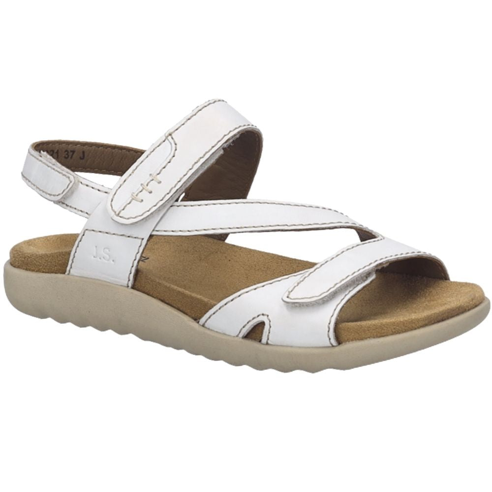 A white leather strappy sandal with adjustable straps and a tan footbed, shown from a side angle on a white background.