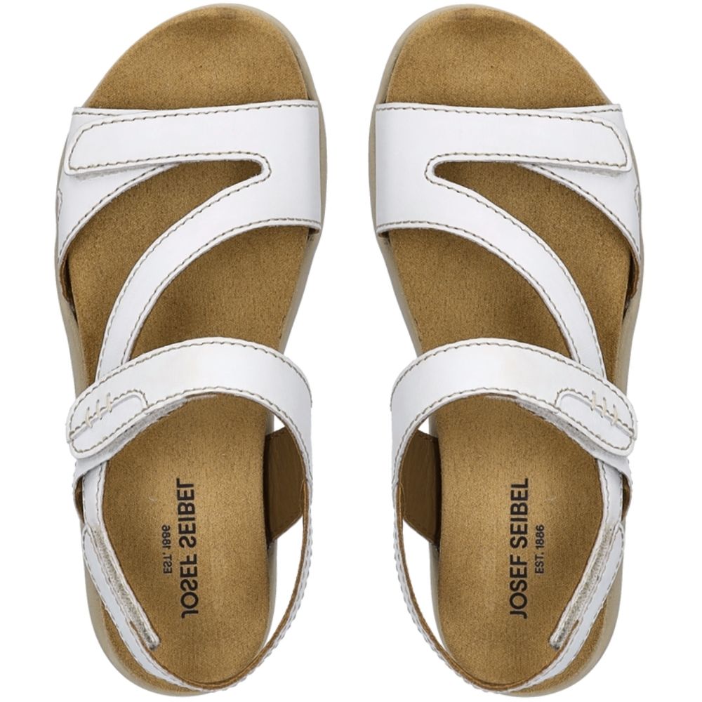A pair of Josef Seibel sandals with white straps and a tan footbed, shown from a top-down view on a white background.