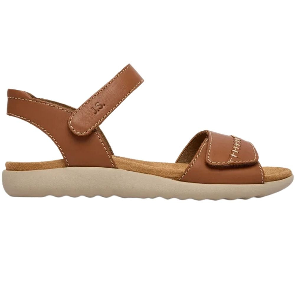 A single tan leather sandal with an adjustable ankle strap and a wide front strap, shown in profile against a plain white background.