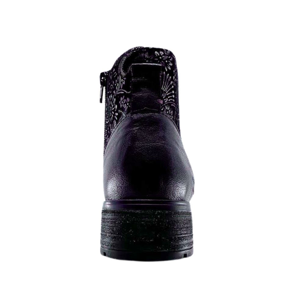 Black boot with floral pattern on a white background