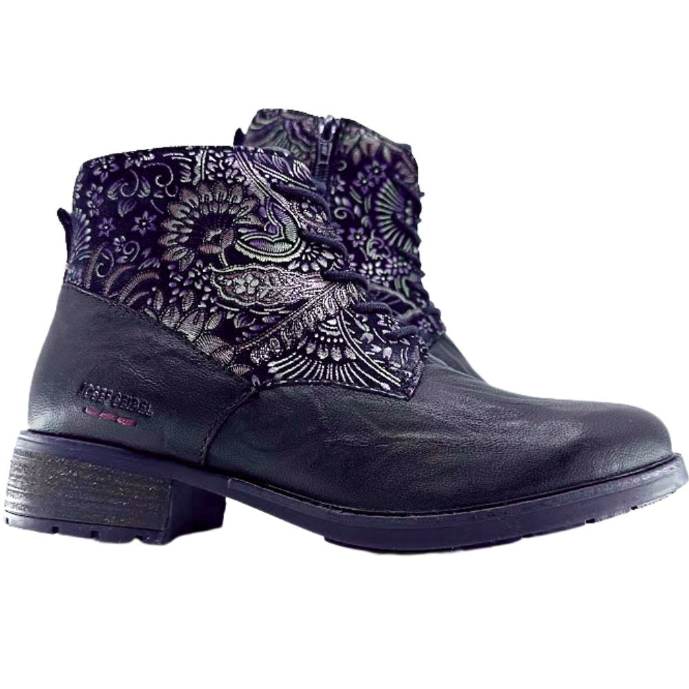 Black boot with floral patterned cuff on a white background