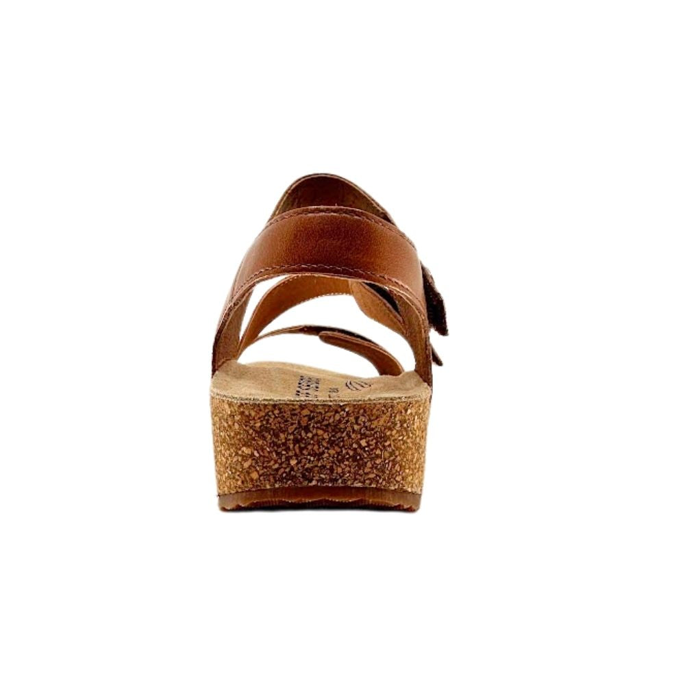 A single brown leather platform sandal with a cork mid-sole, shown from the back against a plain white background.