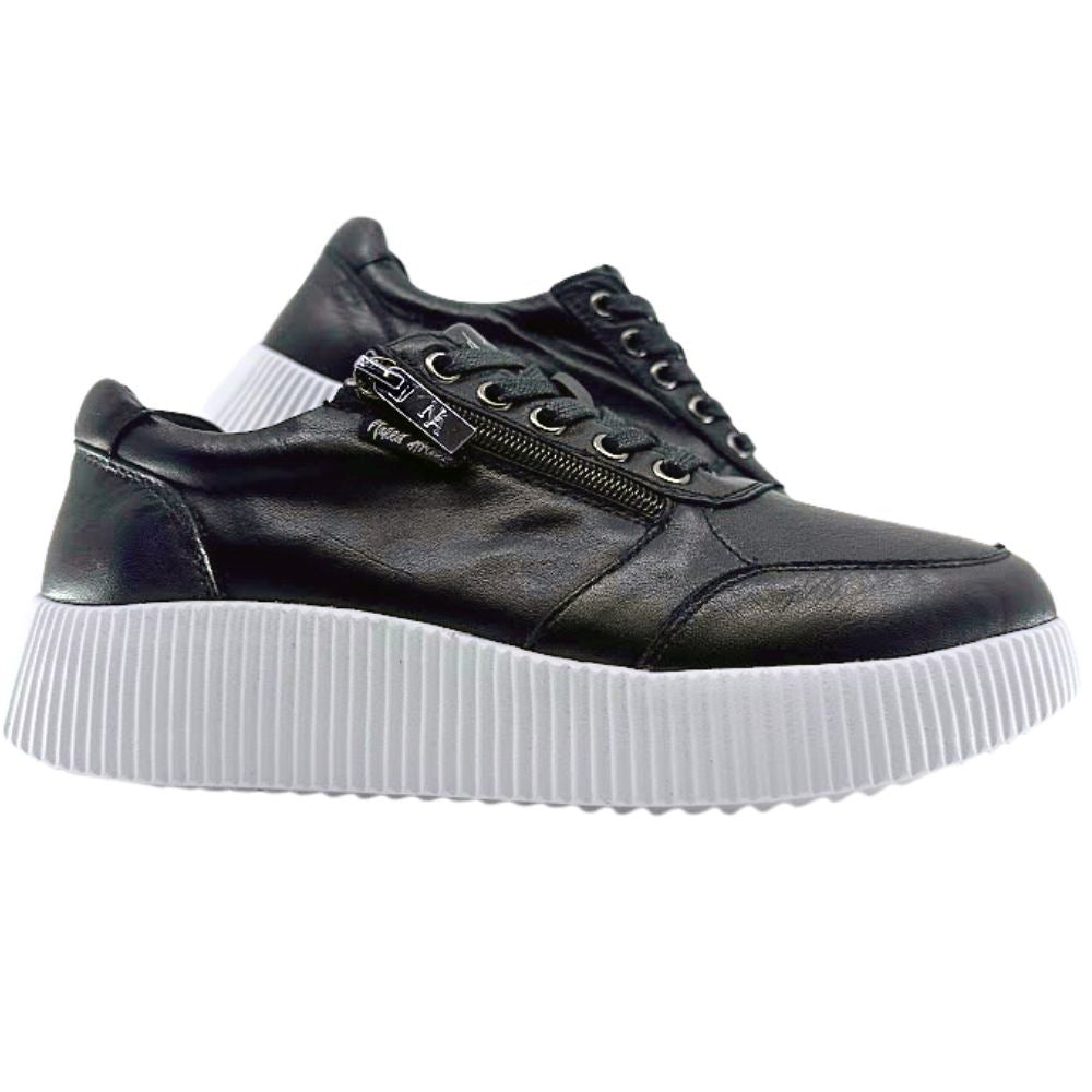 Black sneaker with white sole on a white background