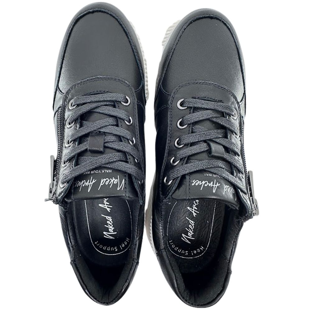 Pair of black sneakers with visible brand name on a white background