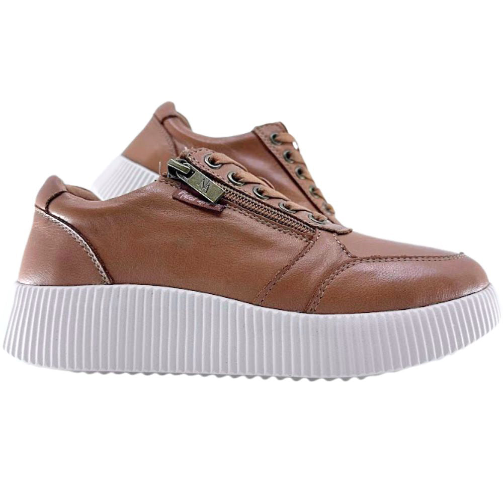 Tan leather sneaker with white sole on a white background