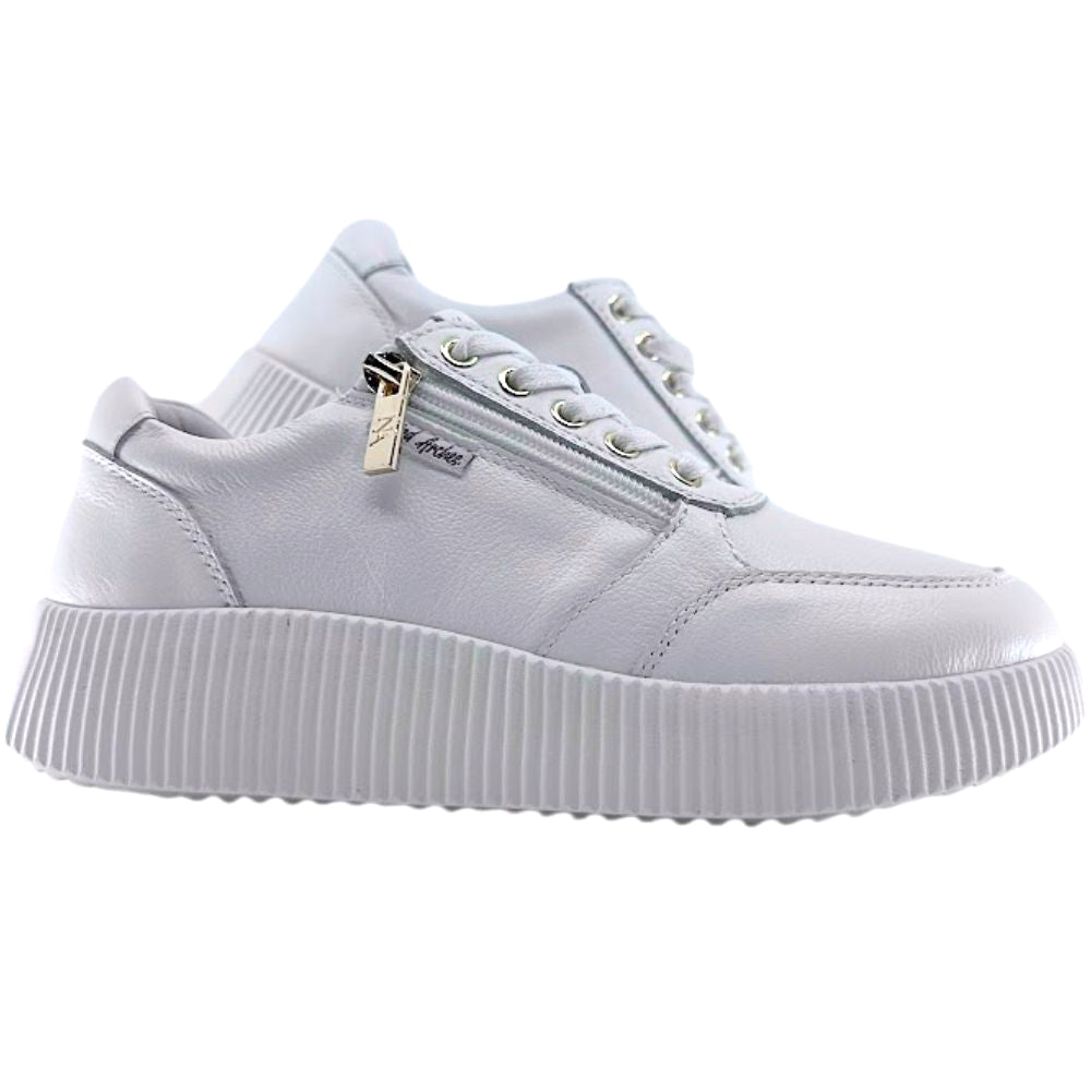 White sneaker with a gold zipper on a white background