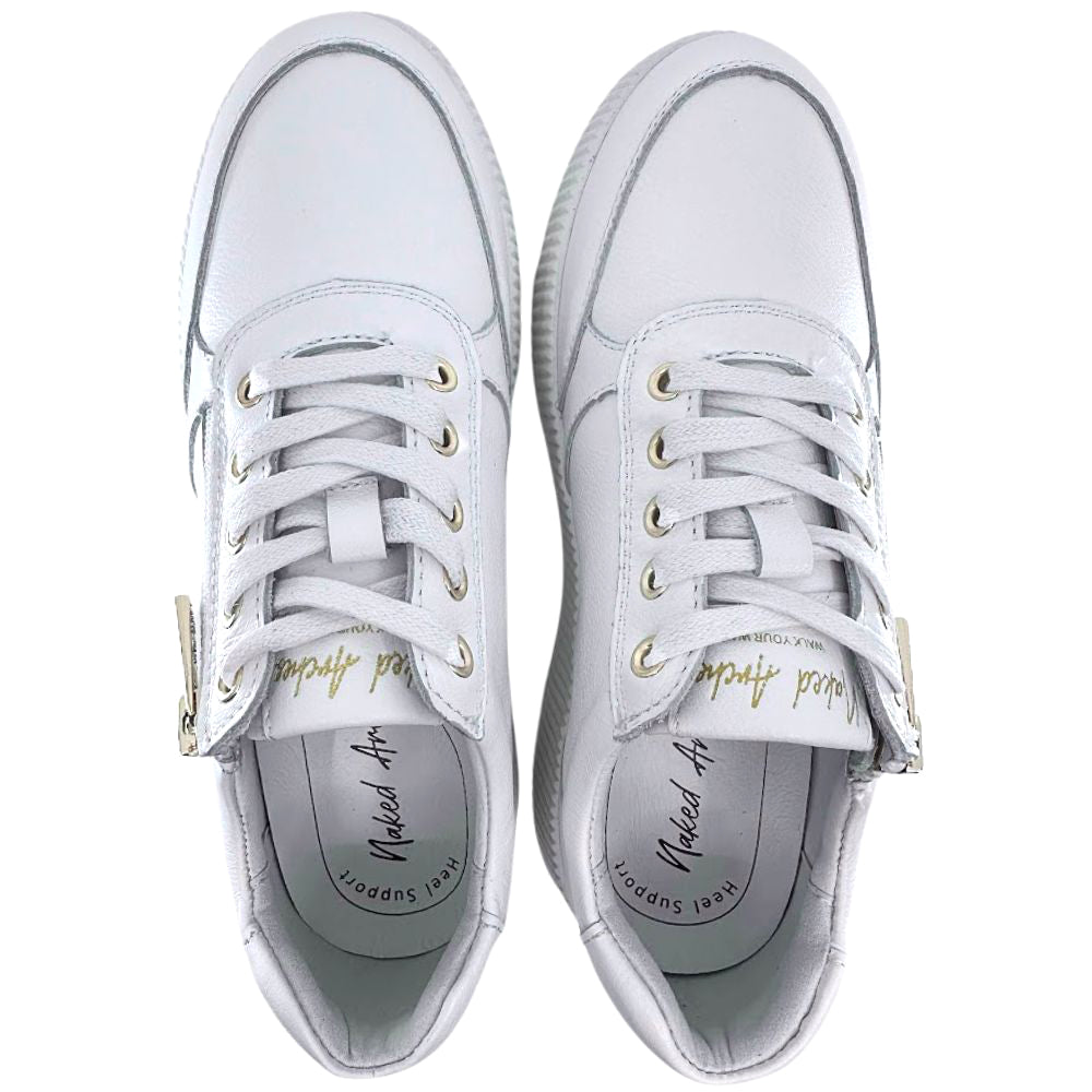 White sneakers with gold accents on a white background