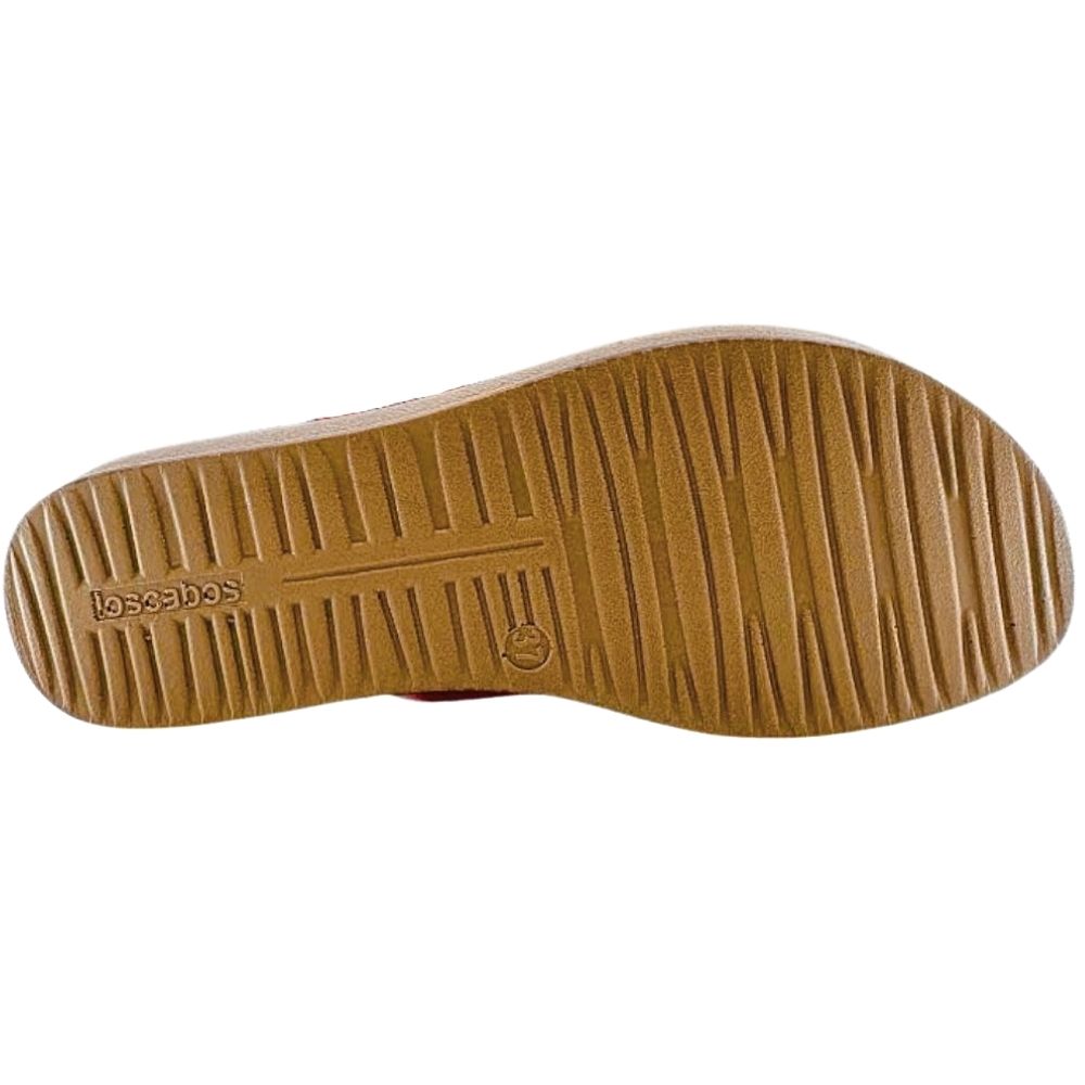 The tan rubber outsole of a shoe, showing the tread pattern and embossed 'Los Cabos' brand name, isolated on a white background.
