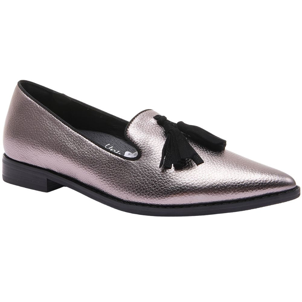 Metallic loafer with a tassel on a white background