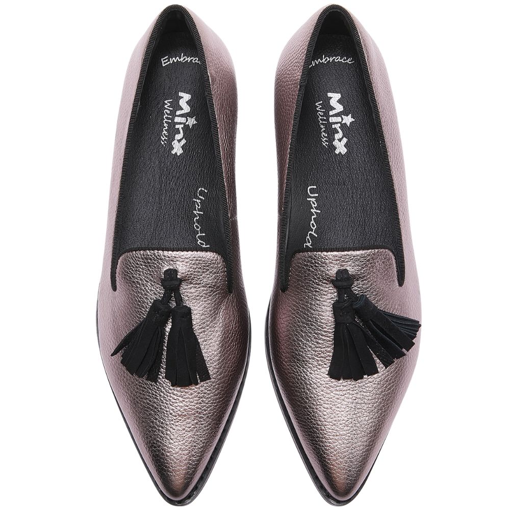 Pair of metallic loafers with tassels on a white background
