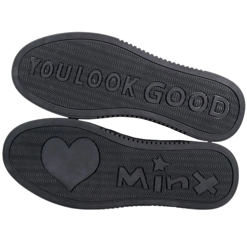 Black shoe sole with text and heart design on a white background