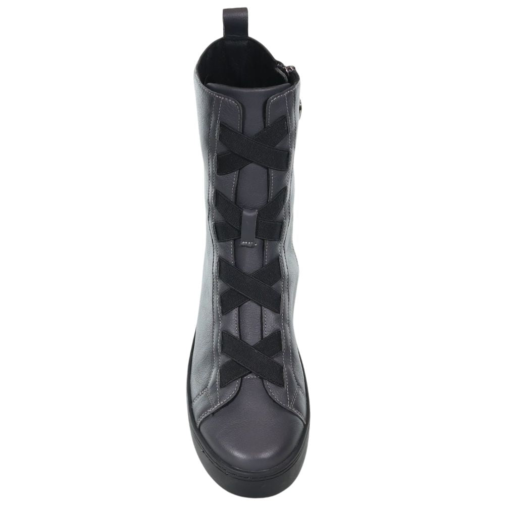 Grey leather boot with black criss-cross detailing on a white background