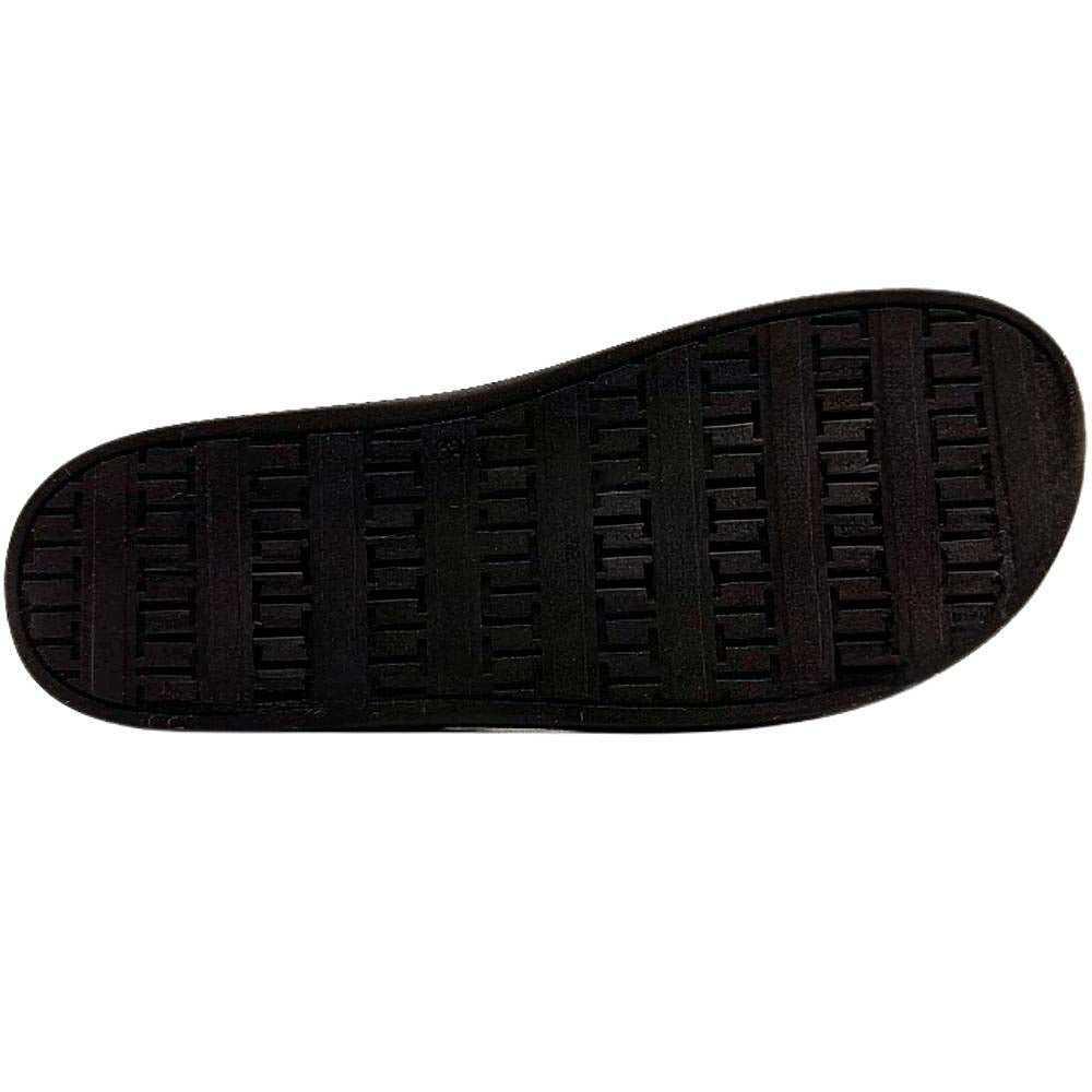 A close-up view of a black textured shoe sole, showing its tread pattern, isolated on a white background.