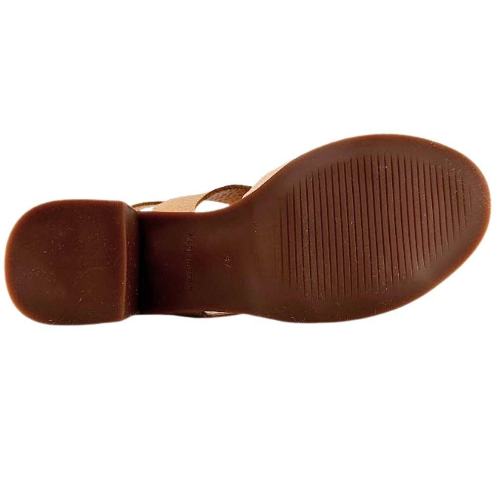 A close-up view of a brown sandal's sole, showing the textured outsole and heel block against a plain white background.