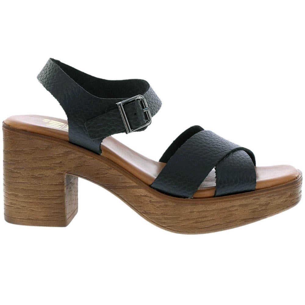 A single women's platform sandal with a chunky wooden block heel and platform, featuring textured black leather straps and a silver buckle, shown against a plain white background.