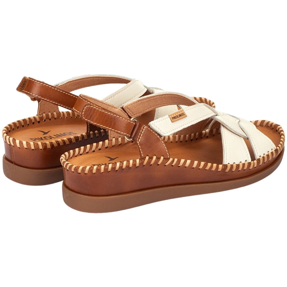 A pair of women's brown leather sandals with cream-colored woven straps, shown from a three-quarters angle on a white background.