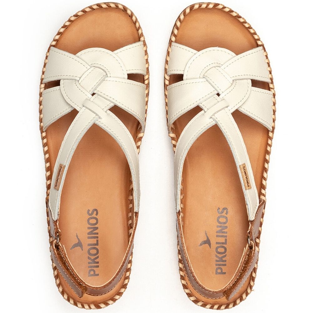 A pair of Pikolinos women's sandals shown from a top-down view. The sandals feature off-white leather straps with a braided detail at the center, a tan leather footbed, and a braided rand edge.