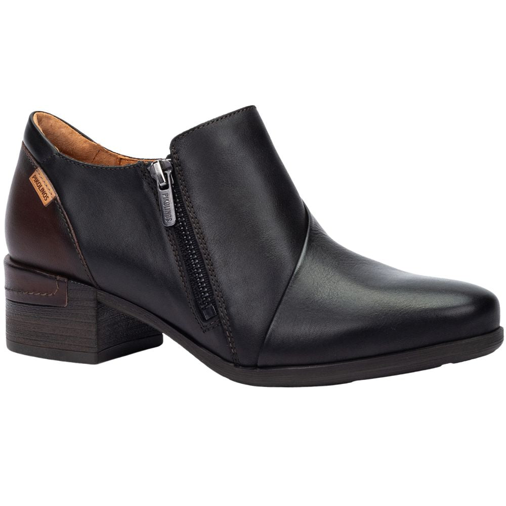 Black leather ankle boot with a zipper on a white background