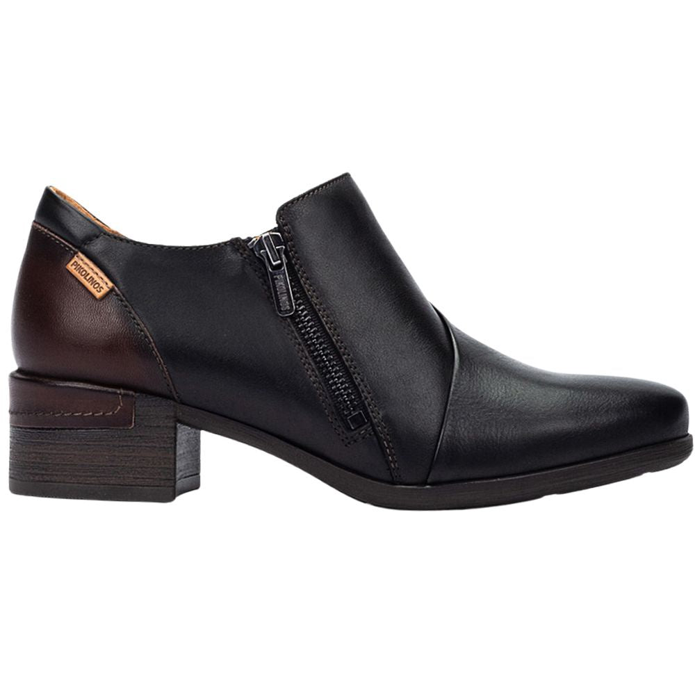 Black leather shoe with a zipper on a white background