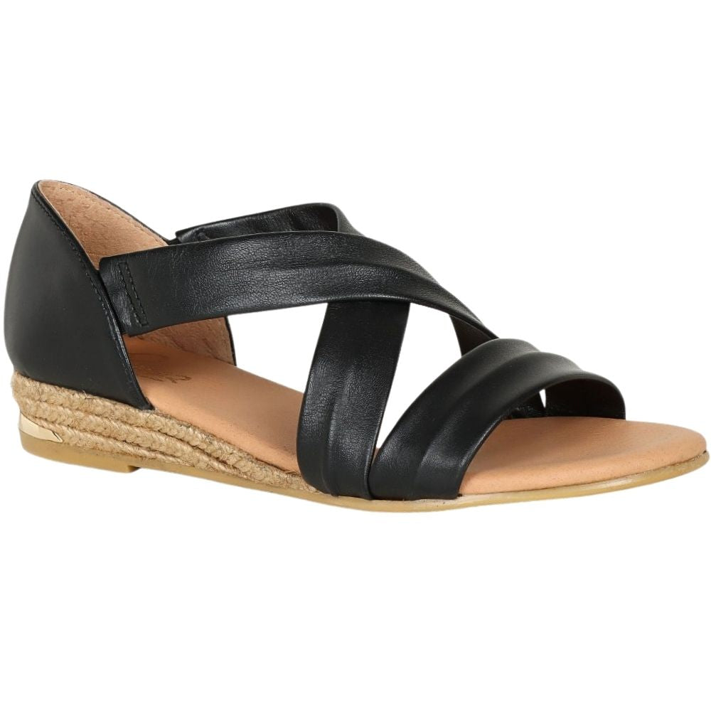 A black leather espadrille sandal with criss-crossing straps and a braided jute wedge heel, shown from a side profile on a white background.