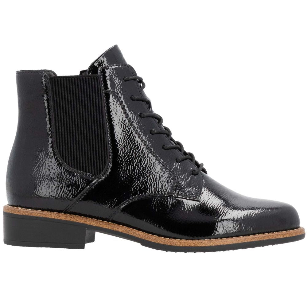 Black patent leather ankle boot on a white background