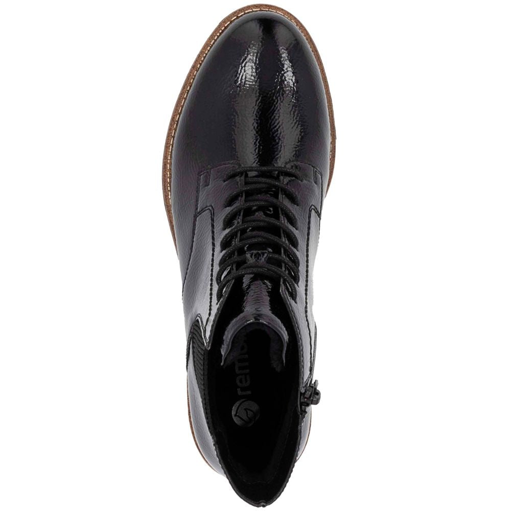 Black shiny boot with a brand logo on a white background