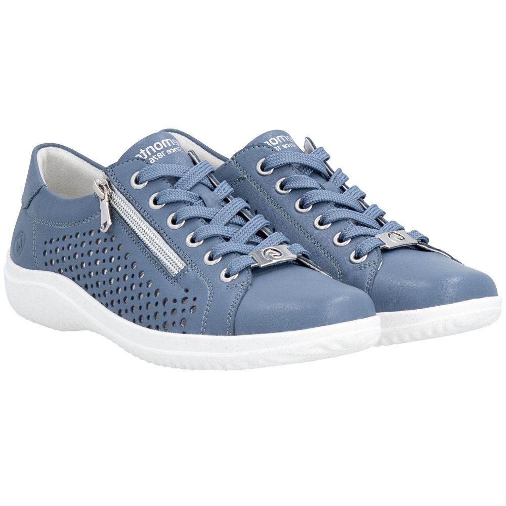 A pair of light blue low-top leather sneakers with perforated side panels, a silver zipper on the outer side, matching blue laces, and white soles, shown against a plain white background.