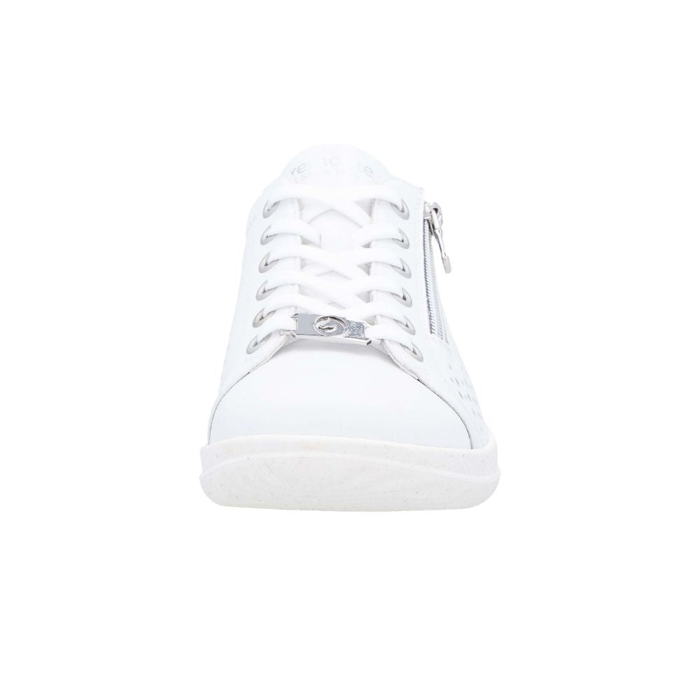 A white leather low-top sneaker shown from the front, featuring white laces, a silver metal eyelet detail, and a side zipper on a plain white background.