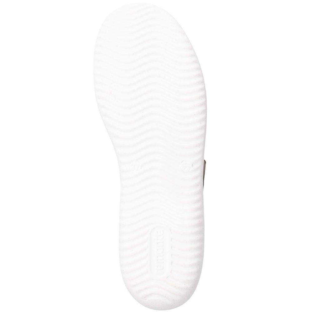 White shoe sole with a wavy tread pattern, shown from a top-down view on a white background.