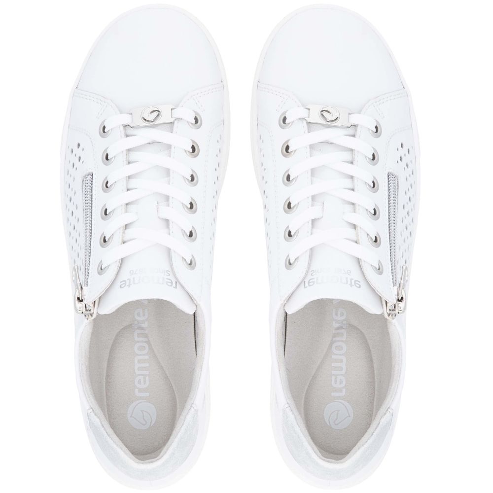A pair of white Remonte low-top sneakers shown from a top-down view, featuring white leather uppers, white laces, perforated side details, and silver zippers on the outer sides.