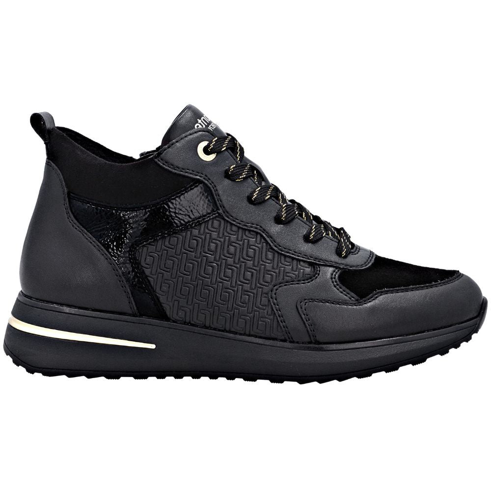 Black sneaker with a textured pattern on a white background