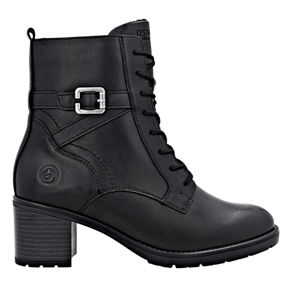 Black leather boot with a buckle on a white background