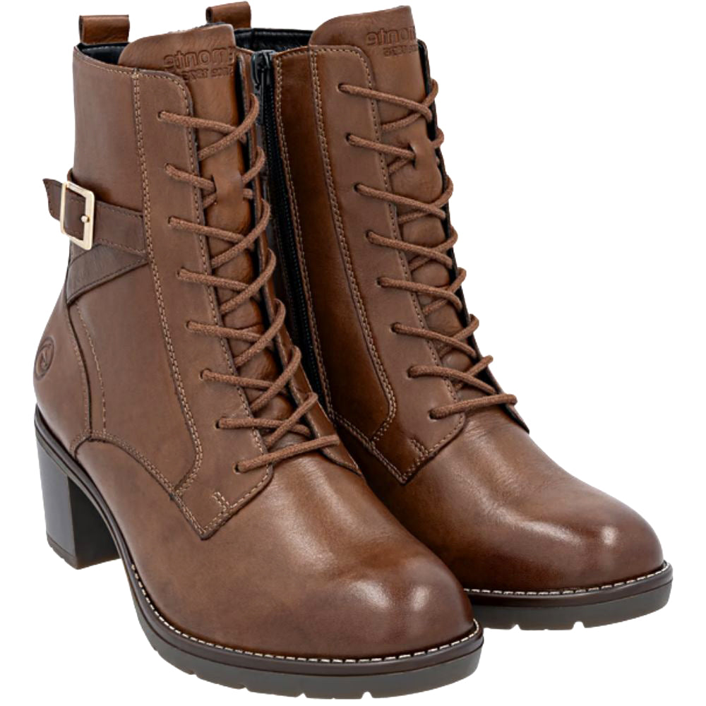 Pair of brown leather boots with lace-up design on a white background