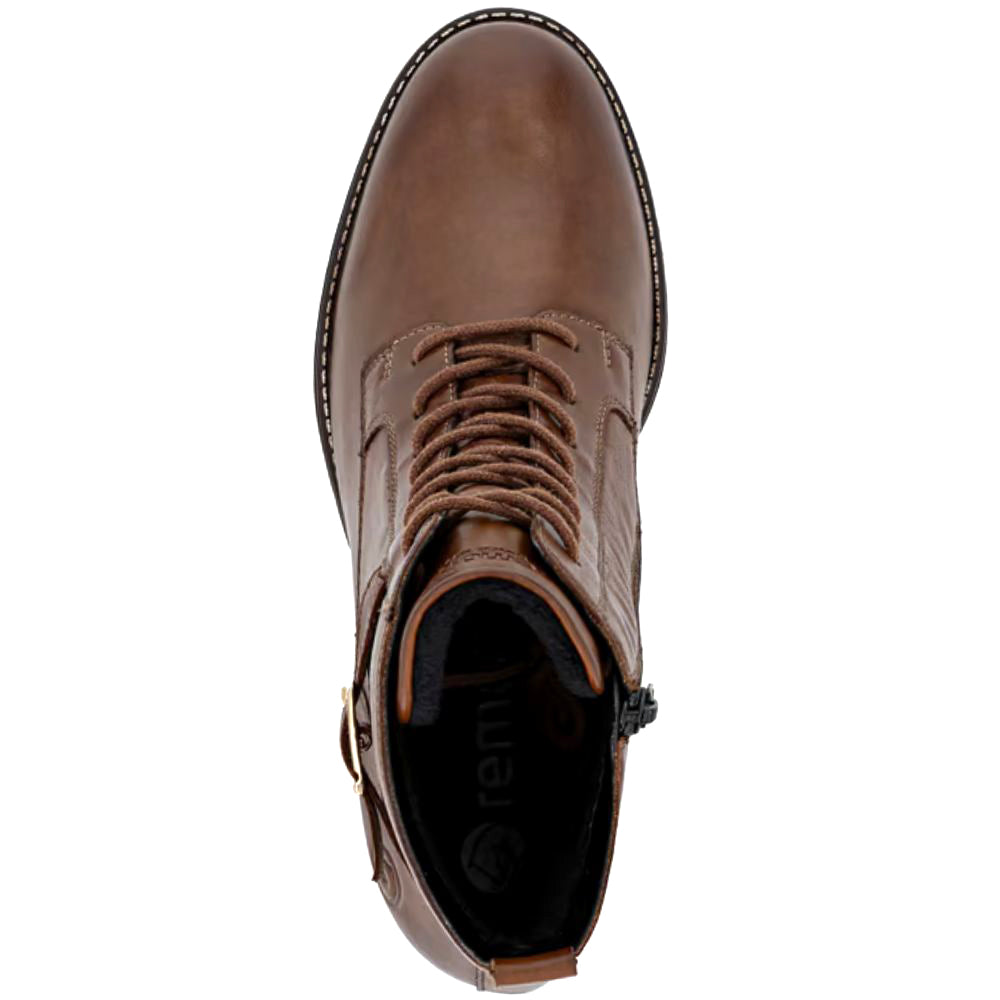 Brown leather boot with laces on a white background