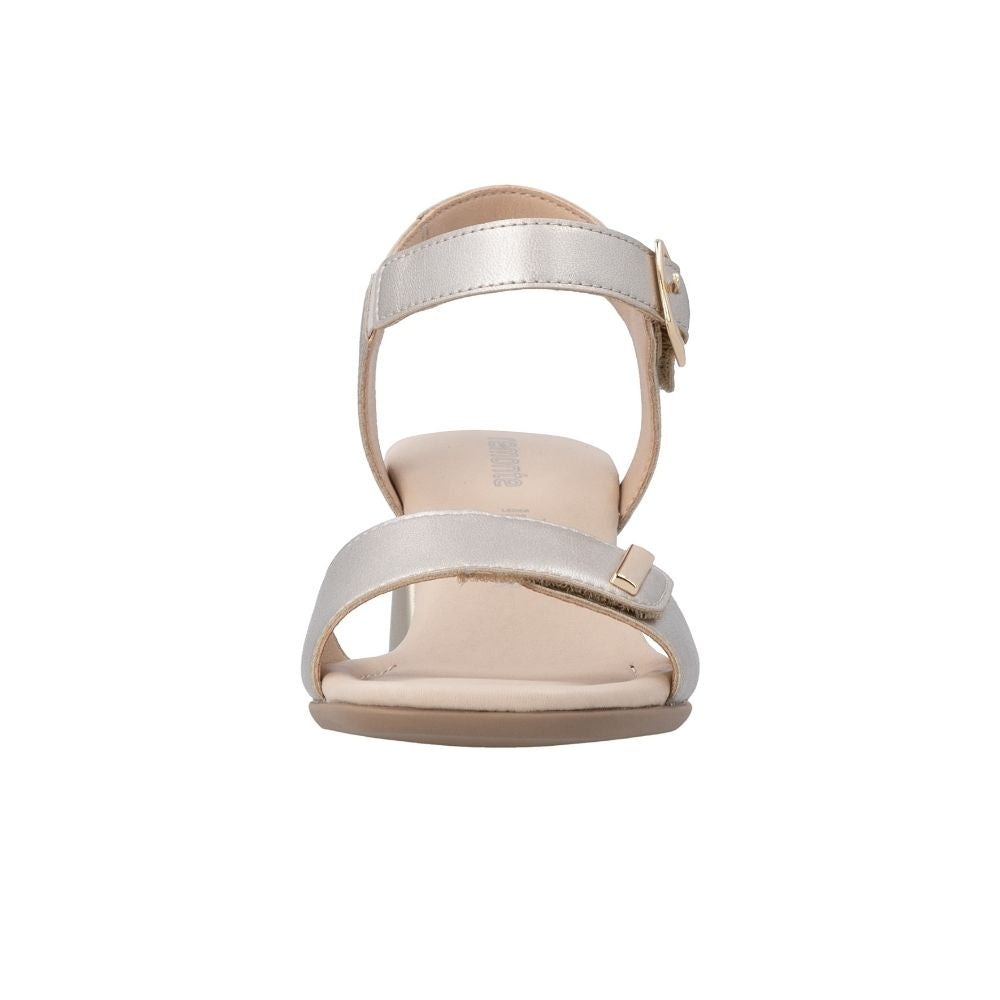 A single women's heeled sandal with pale gold leather straps and a beige footbed, shown from a front-facing perspective on a white background.
