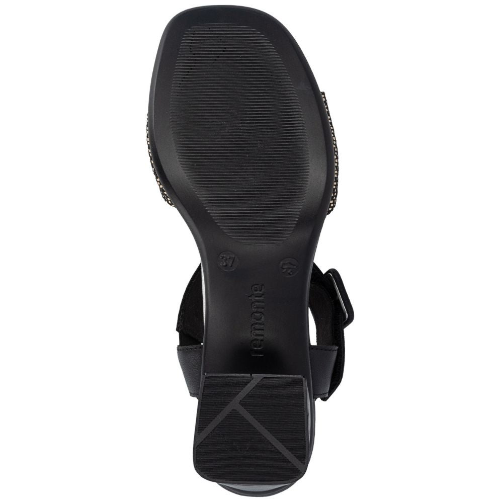 Black sandal sole view with a square toe, and adjustable strap, shown on a white background.