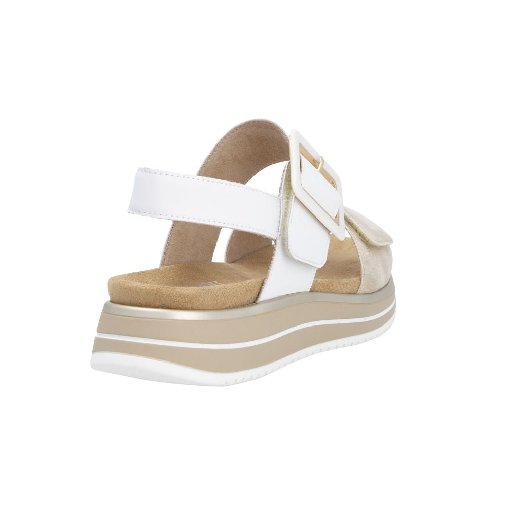 A white and pale gold leather platform sandal with a beige insole and sole, featuring a double strap design with a Velcro closure with a decorative square buckle, shown from a side-rear angle on a white background.