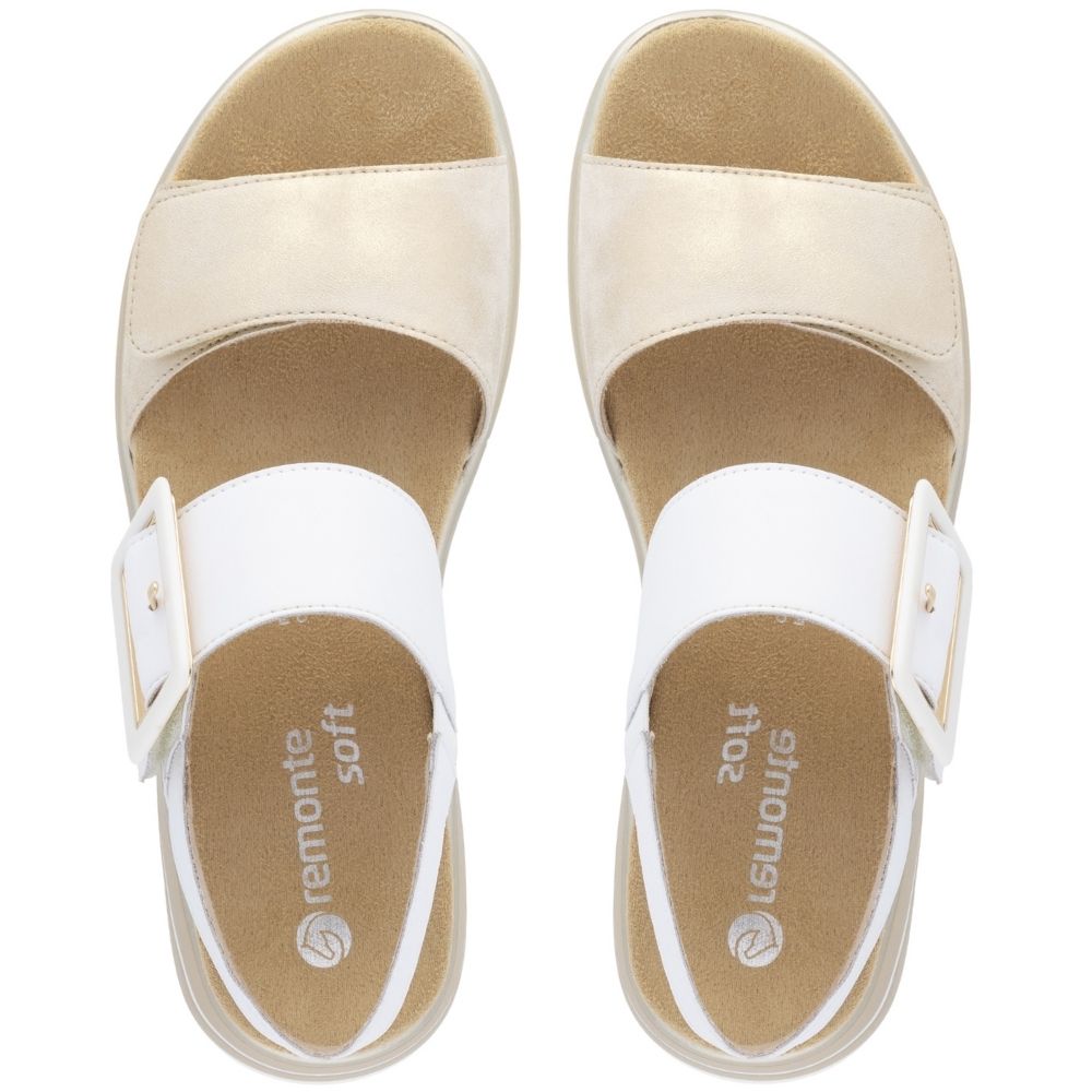 A pair of Remonte Soft slide sandals in white and pale gold leather, shown from a top-down view on a white background.