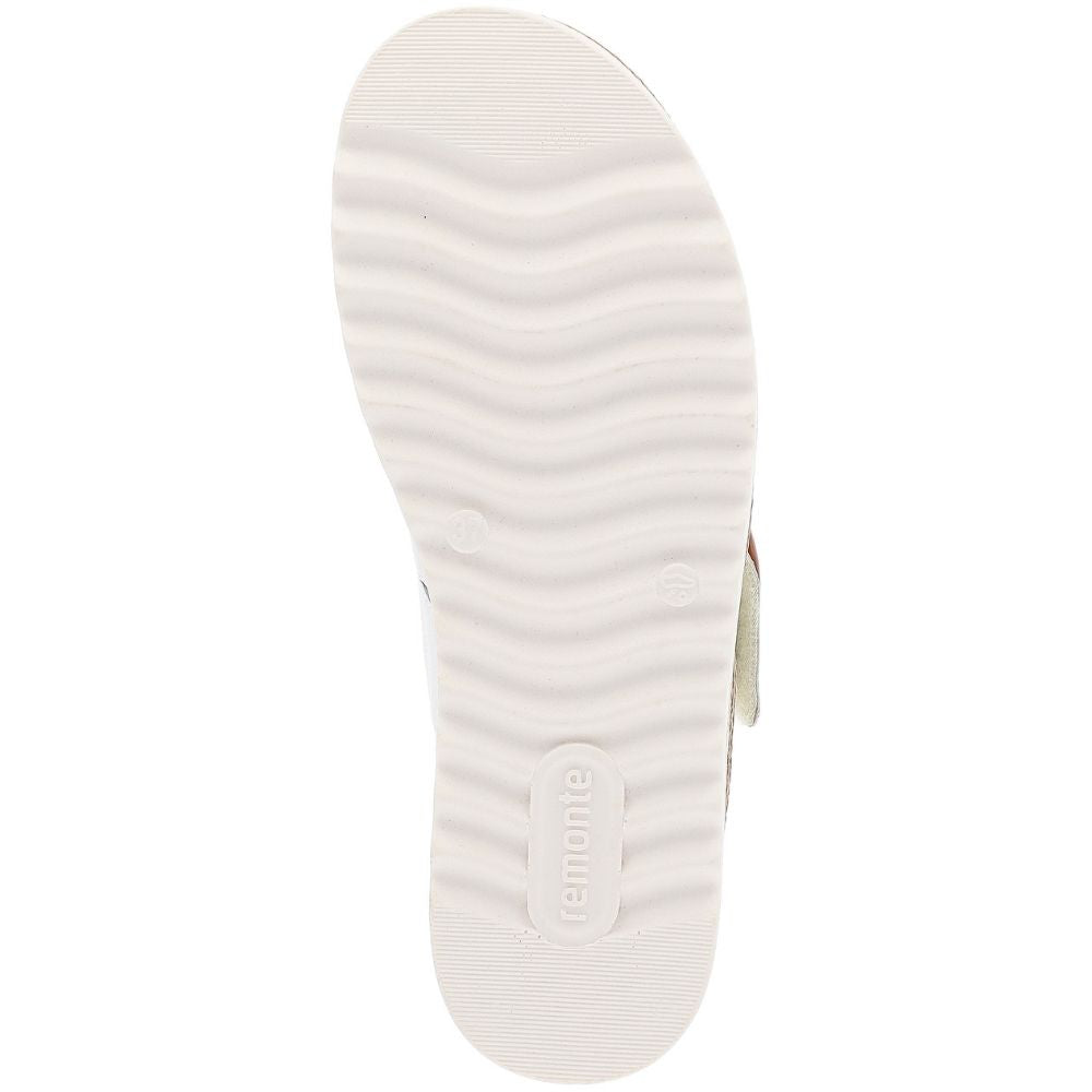 A top-down view of a white Remonte shoe sole, showing its wavy tread pattern and embossed brand name, set against a plain white background.
