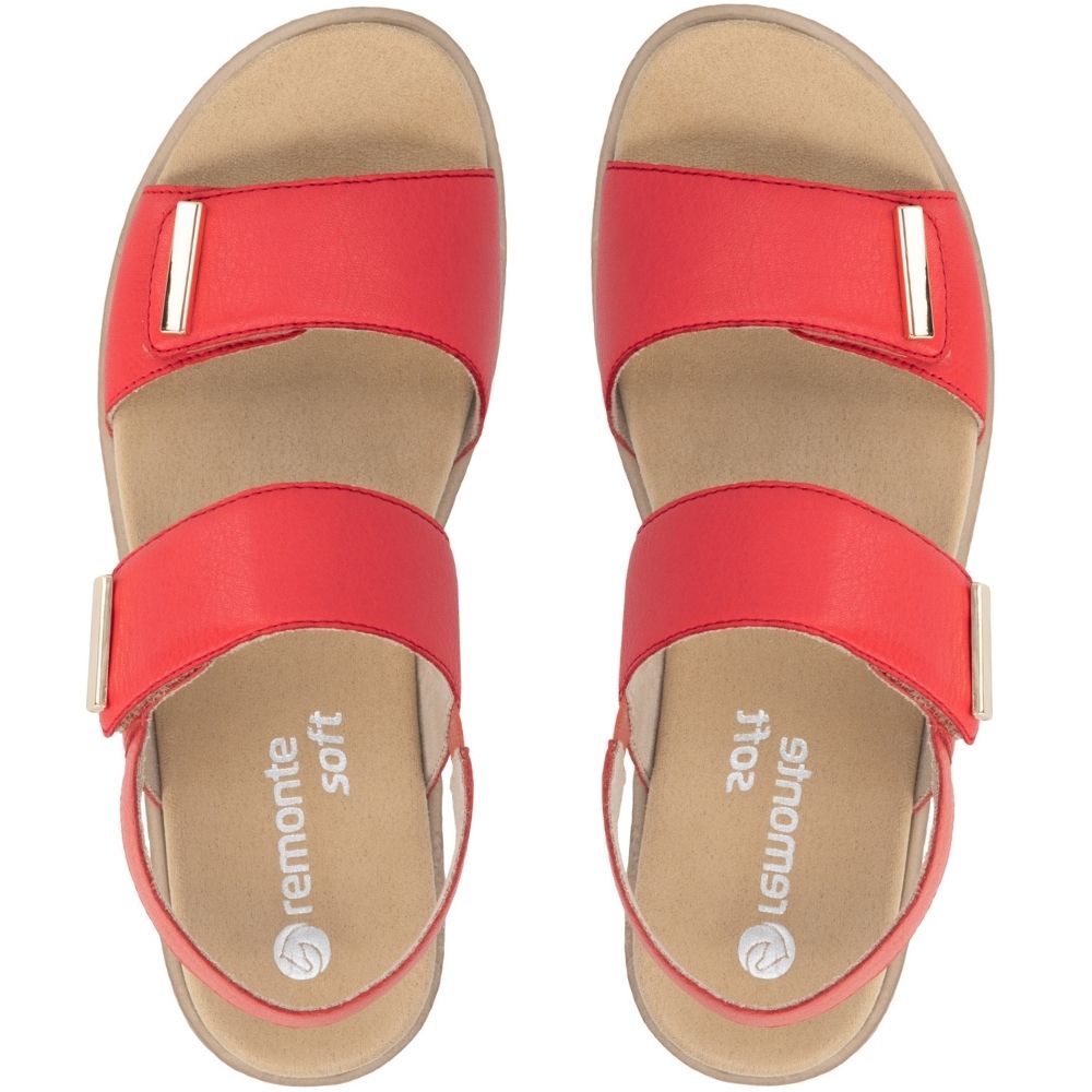A pair of Remonte Soft slide sandals in red leather with gold metallic accents, shown from a top-down view on a white background.