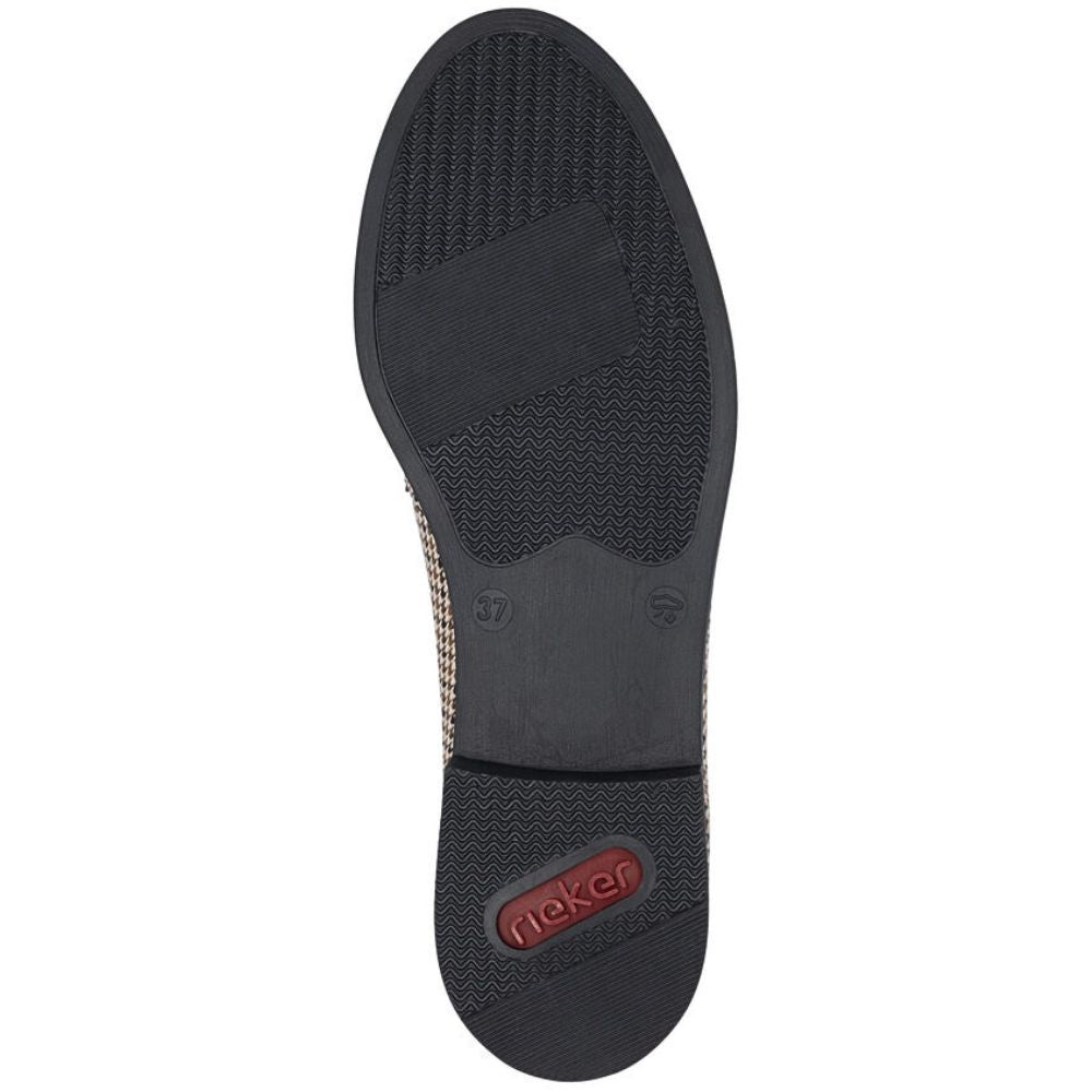 Black shoe sole with a brand logo on a white background