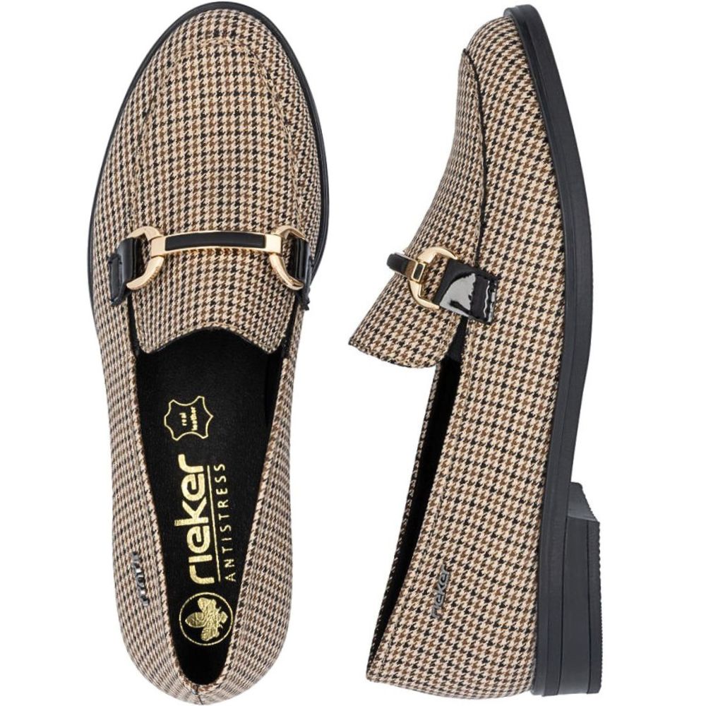 Pair of houndstooth pattern loafers with a gold buckle on a white background